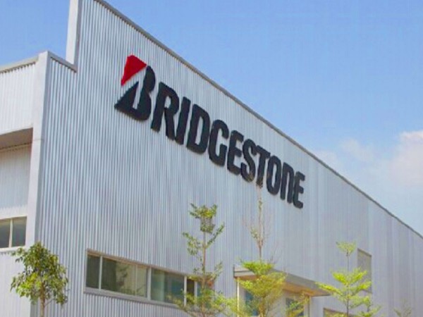 工业滑升门给力，普利司通常熟工厂温暖过冬